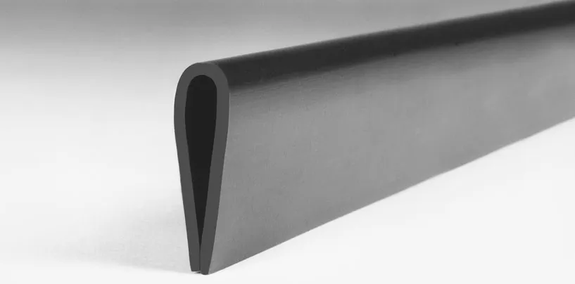 Close up of Grey Nyla-Glide GR 1″ profile for protecting metal conveyor rails